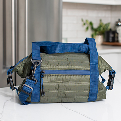 ONIVA<sup>&reg;</sup> Midday Washable Lunch Bag - This stylish cooler tote (Olive Green) is not only fully insulated it’s also machine washable. Featuring a lunchbox with zipper closure, quilted soft side fabric, and PEVA liner to keep your items fresh. Measuring 6" x 10" x 6" there's space for everything you need to tote and the detachable shoulder strap ensures it's easy to carry. 